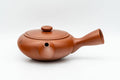 Tezumi — Japanese Kyusu - Calligraphy Engraved Red Shudei Tokoname-yaki Debeso Teapot - 140ml — top-down view of the lid
