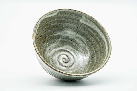 Overhead view into the bowl, showing the spiral pattern in the glazed interior well.