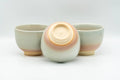 Japanese Teacups - Set of 3 Beige Pink Hagi-yaki Yunomi - 110ml - the three cups arranged in a row