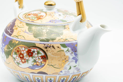 Japanese Tea Set - Floral Arita-yaki Dobin Teapot with 3 Lidded Yunomi Teacups - overhead close-up of the teapot lid