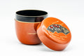 Japanese Natsume - Orange Gold Floral Lacquered Matcha Tea Caddy - 100ml - three-quarter view with the lid removed and set beside the body, showing the black interior and the gold floral fan motif on the lid