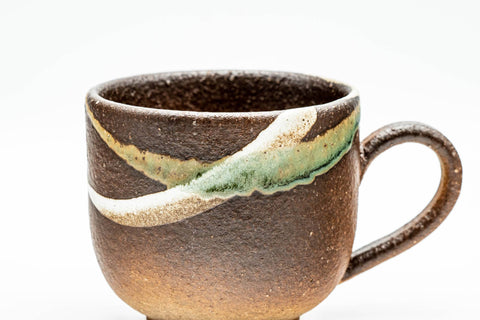 Japanese Teacups - Pair of Brown Textured Ushirode Yunomi - 150ml - three-quarter view of one cup