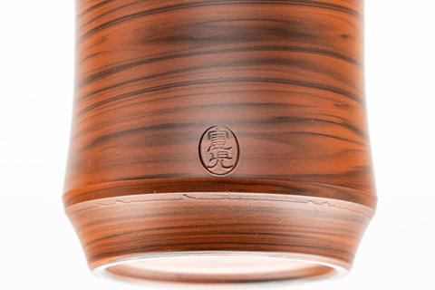 Tezumi — Japanese Teacups - Pair of Red Nerikomi Tokoname-yaki Meoto Yunomi — tipped to show the interior
