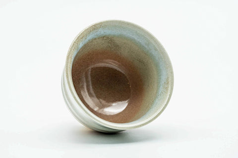 Overhead view into the cup, showing the glazed interior.