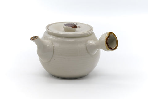 Tezumi — Japanese Tea Set - Daruma Kyusu Teapot with 4 Yunomi Teacups — interior of the teapot showing the filter