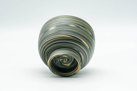 Japanese Teacup - Green, Yellow, and White Nerikomi Tokoname-yaki Yunomi - 100ml - tilted view showing the marbled pattern and base