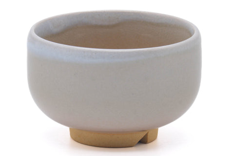 Tezumi — Japanese Teacup - Beige White Glazed Hagi-yaki Yunomi - 170ml — tipped to show the interior