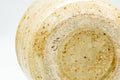 Underside of the teacup showing the unglazed stoneware foot ring.