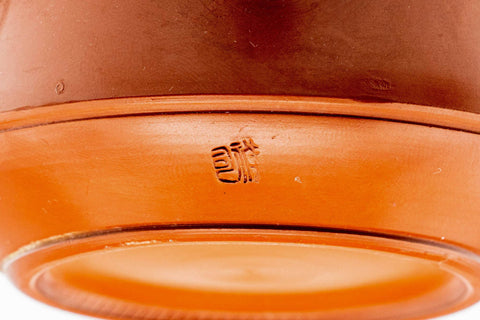 Close-up of the red shudei clay surface where the lid meets the body.