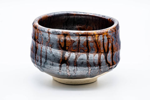 Opposite side showing the streaked metallic brown drip glaze
