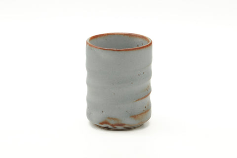 Tezumi — Japanese Teacup - Orange White Glaze Yunomi - 110ml — front view from another angle
