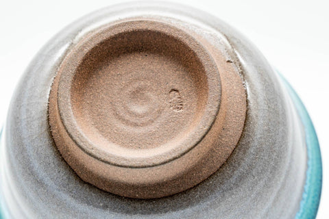 Underside view of the Agano-yaki teacups showing the unglazed clay foot