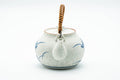 Japanese Dobin - Blue Floral White Textured Arita-yaki Porcelain Teapot - 500ml - front view showing the spout and overhead handle