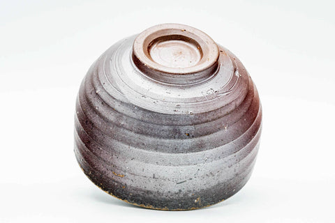 Inverted view of the Bizen chawan showing the carved foot and spiral underside