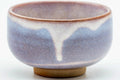 Close-up of the lavender-and-white drip glaze.