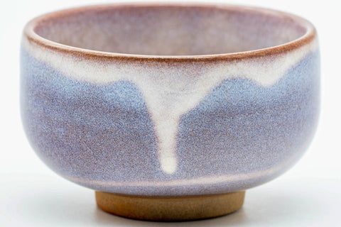 Close-up of the lavender-and-white drip glaze.
