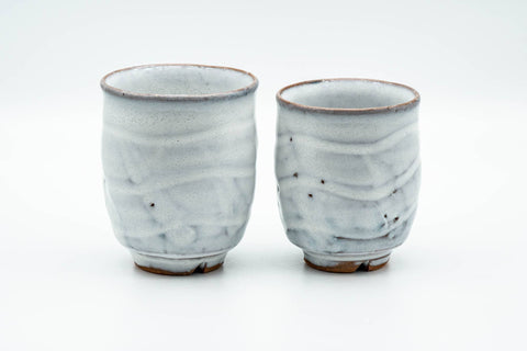 Tezumi — Japanese Teacups - Pair of Milky White Glazed Wavy Meoto Yunomi — front view