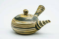 Nerikomi Tokoname-yaki side-handled kyusu teapot with a swirled green, yellow and cream marbled body, front view with handle to the right.