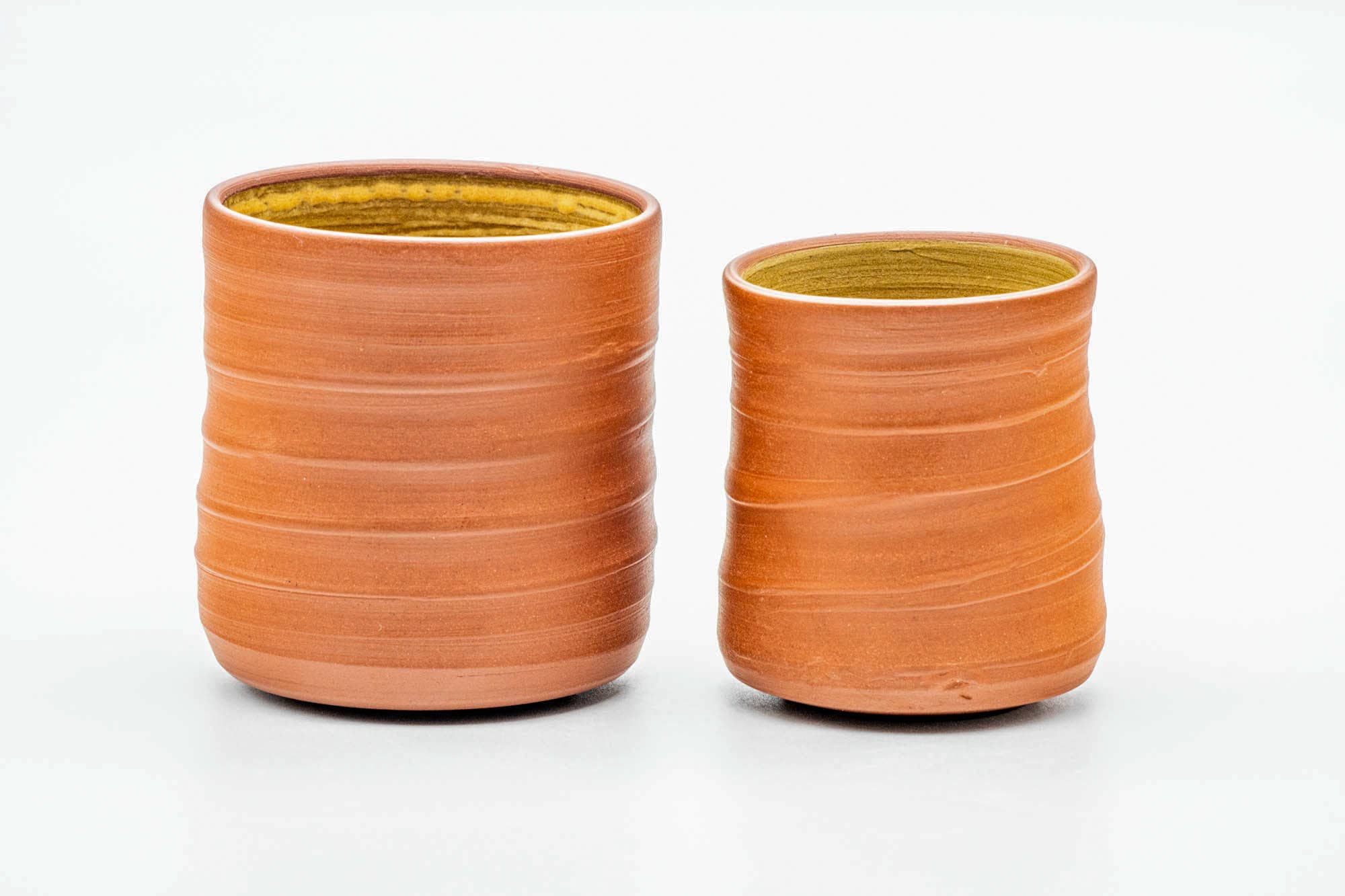 Japanese Teacups - Pair of Spiraling Orange Yellow Hakeme Meoto Yunomi