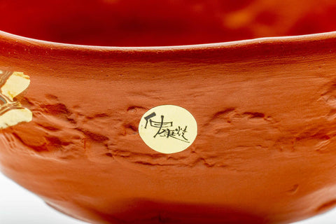 Closeup of the rim and interior of the Tokoname chawan with the maker's sticker