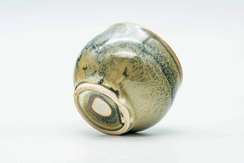 Underside of the cup showing the unglazed foot ring.