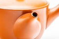 Tezumi — Japanese Kyusu - Classic Red Shudei Tokoname-yaki Mesh Teapot - 275ml — closeup of the decoration