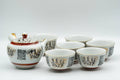 Tezumi — Japanese Tea Set - Geometric Script Kutani-yaki Debeso Kyusu Teapot with Katakuchi Water Cooler and 5 Yunomi Teacups — the full set arranged together