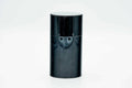 The slim cylindrical canister seen straight-on with lid on, showing the orange foliage decoration