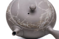 Mogake yakishime unglazed Tokoname kyusu teapot with side handle - top-down view of the lid and body with mogake streaks
