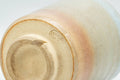 Tezumi — Japanese Teacup - Beige White Glazed Tsutsu-gata Hagi-yaki Yunomi - 140ml — inverted showing the foot ring