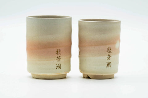 The pair from another angle, showing the spiraling glaze.