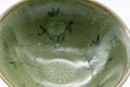 Tezumi — Japanese Matcha Bowl - Green Celadon Hira-gata Chawan - 150ml — tipped to show the interior