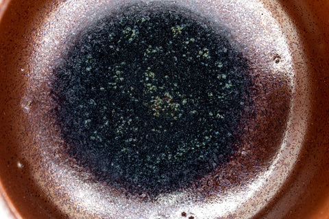 Tezumi — Japanese Matcha Bowl - Brown Black Spiraling Chawan - 500ml — tipped to show the interior