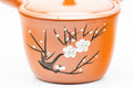 Tezumi — Japanese Kyusu - Plum Blossom Engraved Tokoname-yaki Mesh Teapot - 300ml — closeup of the base