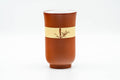 Tezumi — Japanese Teacup - 秋景 Shūkei - Tall Plum Blossoms Yellow Striped Tokoname-yaki Yunomi - 140ml — three-quarter view