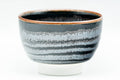 Japanese Teacup - Wavy Tenmoku Glazed Guinomi - 50ml - front view of the wavy tenmoku glaze