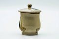 The faceted lidded cup viewed from another angle.