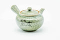 Green celadon Obori Soma-yaki side-handle kyusu, three-quarter view with lid on and crackle glaze