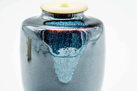 Overhead view of the chaire showing the blue drip glaze and ivory lid from above.