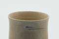 Tezumi — Japanese Teacup - Beige Glazed Egrets Tulip Yunomi - 130ml — tipped to show the interior
