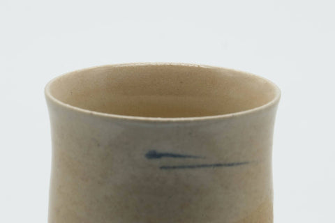 Tezumi — Japanese Teacup - Beige Glazed Egrets Tulip Yunomi - 130ml — tipped to show the interior