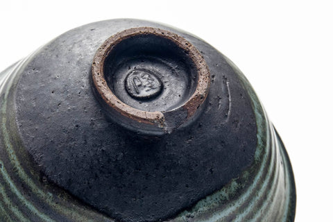 Underside three-quarter view showing the spiralled foot and base.