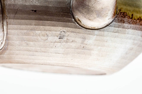 Close-up of the base showing the foot and glaze detail.