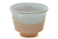 Tezumi — Japanese Teacup - Beige White Glazed Asagao Hagi Yunomi - 110ml — tipped to show the interior