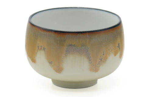Tezumi — Japanese Teacup - White Yellow Brown Drip-glazed Yunomi - 175ml — tipped to show the interior