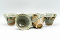 Japanese Tea Set - Hare's Fur Drip-Glazed Akogi-yaki Shiboridashi Teapot with 5 Guinomi Teacups - the five teacups with one tilted to show the interior
