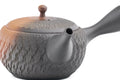 Black-and-red yōhen Tokoname kyusu teapot with side handle and dimpled tochiri texture - high-angle view of the spout and lid