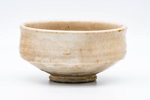 Side view of the shallow matcha bowl showing the soft white glaze.