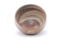 Pink-white hakeme chawan seen from above, looking into the brushed-slip glazed interior