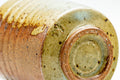 Overhead close-up of the underside showing the foot and base.